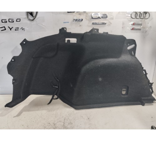 Обшивка багажника левая