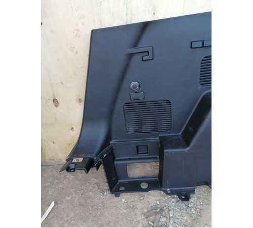 Обшивка багажника левая