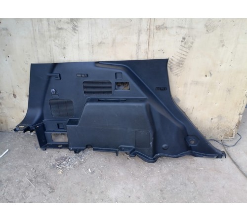 Обшивка багажника левая