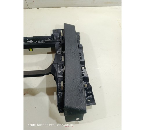 Накладка торпедо центральная нижняя