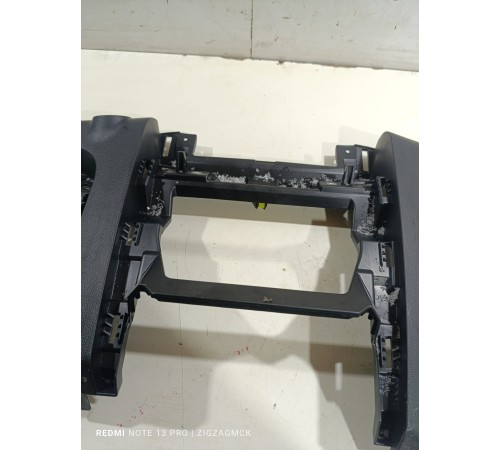 Накладка торпедо центральная нижняя