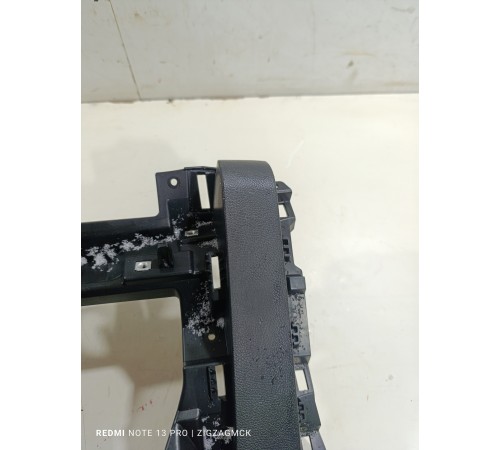 Накладка торпедо центральная нижняя