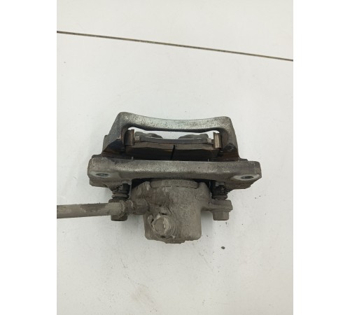 Суппорт задний левый