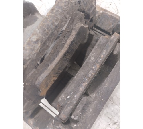 Суппорт тормозной задний левый