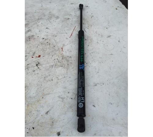 Амортизатор крышки багажника левый