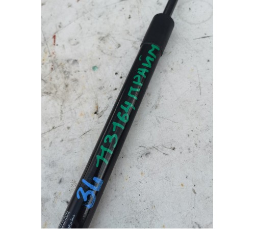 Амортизатор крышки багажника левый