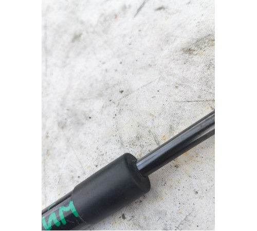 Амортизатор крышки багажника левый