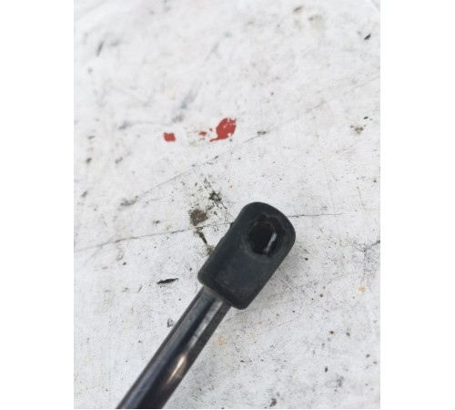 Амортизатор крышки багажника левый