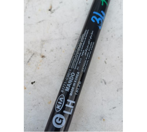 Амортизатор крышки багажника левый