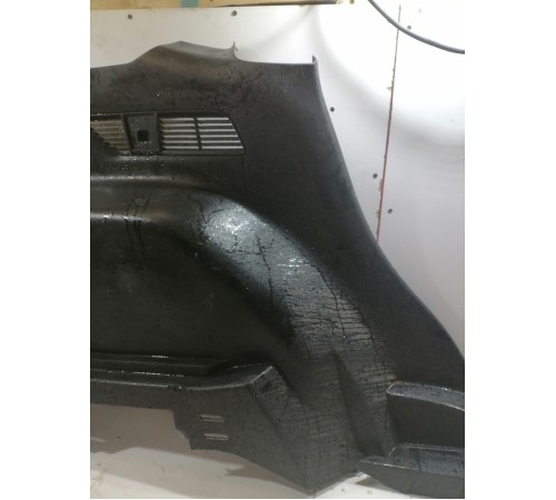 Обшивка багажника левая