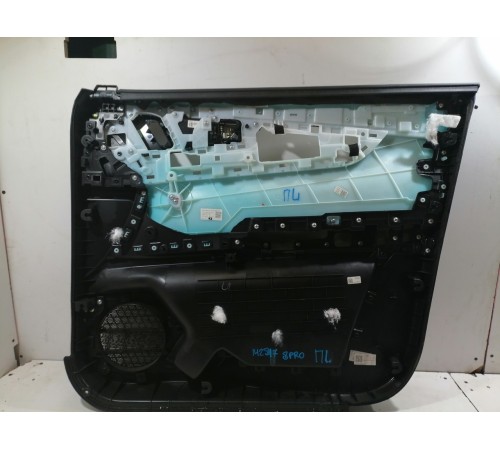 Обшивка двери передняя левая