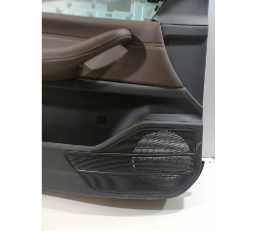 Обшивка двери передняя левая