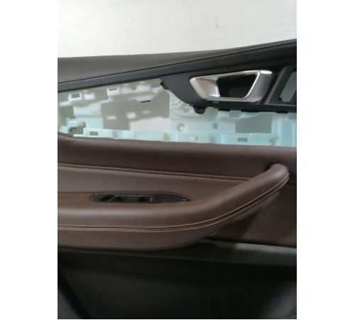 Обшивка двери передняя левая