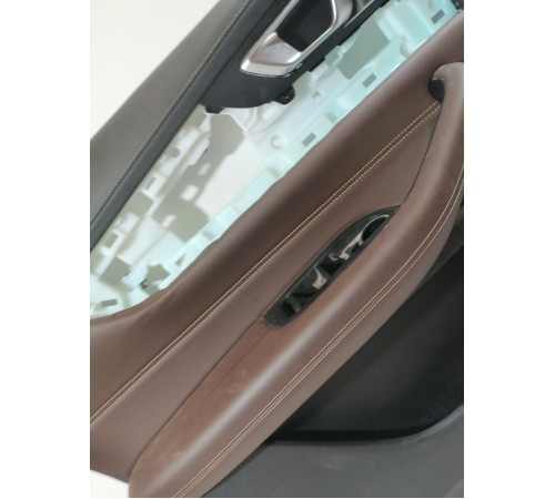 Обшивка двери передняя левая