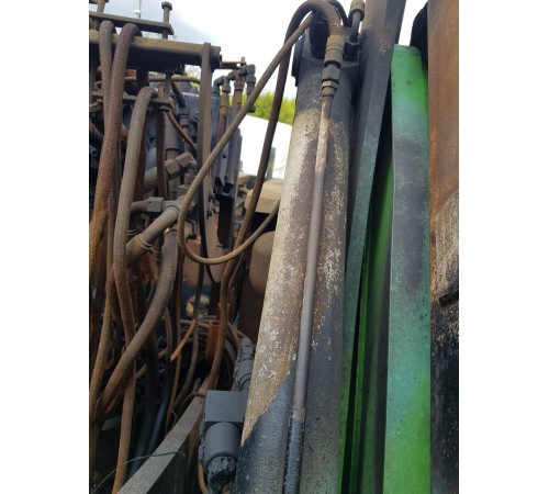 Амортизатор подъема стрелы боковой распределительный средний