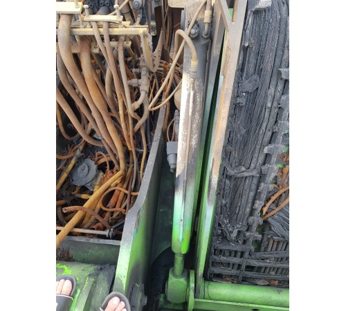 Амортизатор подъема стрелы боковой распределительный средний