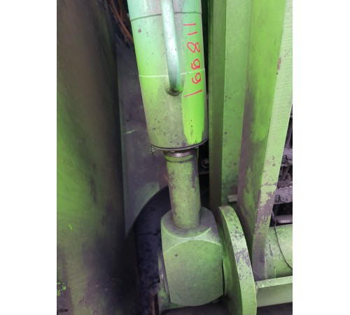 Амортизатор подъема стрелы боковой распределительный средний