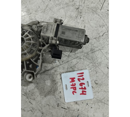 Моторчик стеклоподъемника передний левый