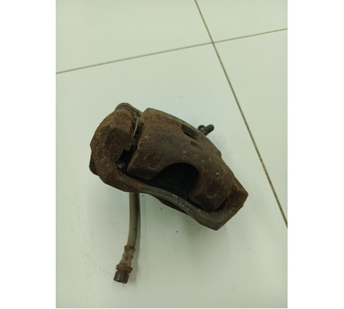 Суппорт тормозной задний левый