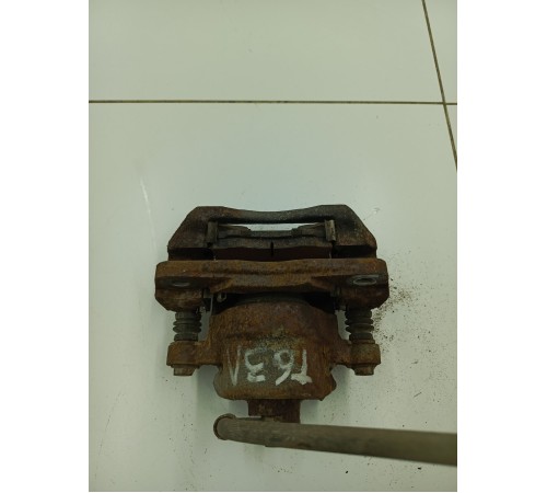 Суппорт тормозной задний левый