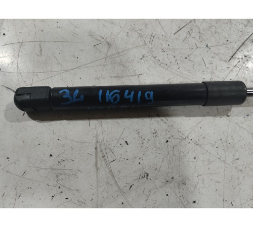 Амортизатор крышки багажника левый