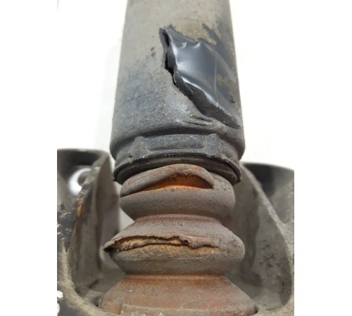 Амортизатор (задний, левый)